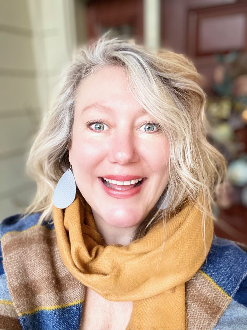 Amanda Lucas, founder of Chews Your Health, smiling outdoors