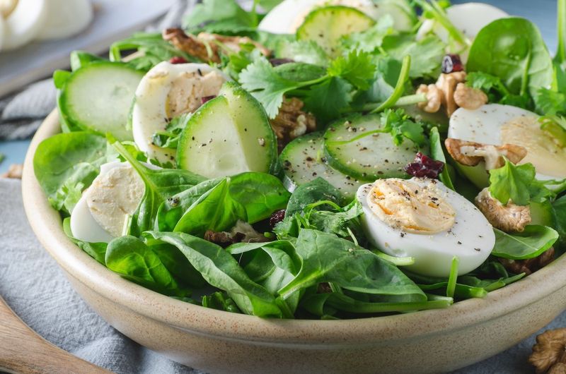 Fresh spinach leaves, an example of the whole-food nutrition Amanda recommends